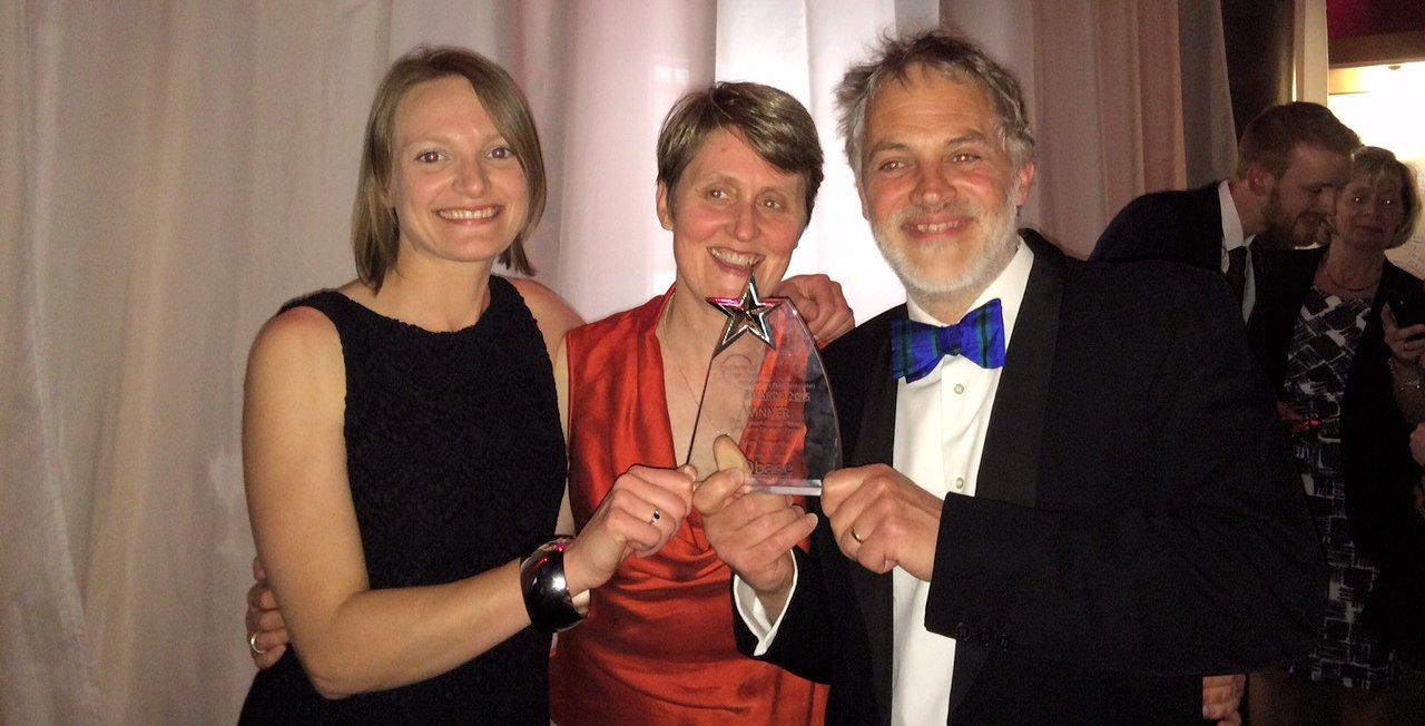 Rosie, Rebecca and Adrian with the Insight Award